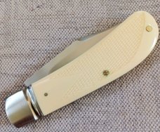 DrT. David Taber, checkered Ivory Lanny Clip..Cpm154 at 4" closed..Comes with all swag shown 
