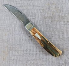 David R. Davis Mammoth ivory Damascus Swayback,closed 4.25" ..fluted...vine filework..MOP shield 