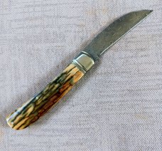 David R. Davis Mammoth ivory Damascus Swayback,closed 4.25" ..fluted...vine filework..MOP shield 