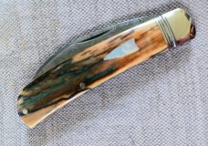 David R. Davis Mammoth ivory Damascus Swayback,closed 4.25" ..fluted...vine filework..MOP shield 