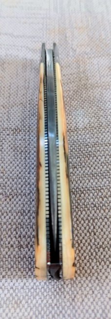 David R. Davis Mammoth ivory Damascus Swayback,closed 4.25" ..fluted...vine filework..MOP shield 