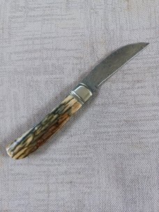 David R. Davis Mammoth ivory Damascus Swayback,closed 4.25" ..fluted...vine filework..MOP shield 