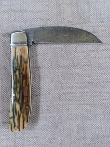 David R. Davis Mammoth ivory Damascus Swayback,closed 4.25" ..fluted...vine filework..MOP shield 