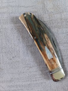 David R. Davis Mammoth ivory Damascus Swayback,closed 4.25" ..fluted...vine filework..MOP shield 