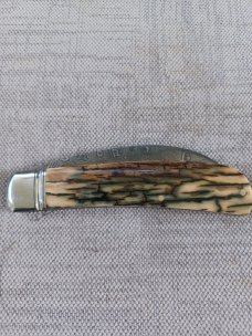 David R. Davis Mammoth ivory Damascus Swayback,closed 4.25" ..fluted...vine filework..MOP shield 