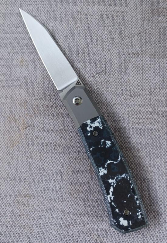 Suprlativ CANIBL Flipper..White Storm Fat Carbon and M390..Bolster Lock,Thumb flip..Oeser/Pena/Garci Suprlativ CANIBL Flipper..White Storm Fat Carbon and M390..Bolster Lock,Thumb flip..Oeser/Pena/Garci