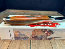Winchester Whittler Burnt Orange Winchester Jigged Bone Cartridge Shield 1997