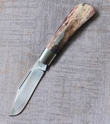 Johan du Plessis Giraffe Bone Lanny..4 25" closed N690... long pull...steel bolsters.coa/pouch 