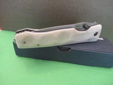 Mcusta Elite Series Liner Lock White  Corian  Model # MC-0126D