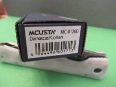 Mcusta Elite Series Liner Lock White  Corian  Model # MC-0126D
