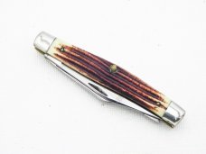 Queen Cutlery #26 Serpentine Burnt Orange Imitation Winterbottom bone:  3 1/4” closed, 1971, Q tang 