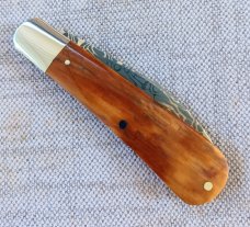 Jeffrey Mitchell Swayback Mammoth Ivory with Vegas Stainless Damascus..3 11/16" clsd..Smooth scales 