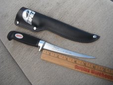Like new Rapala fishing knife with sheath.  Fishing Fillet Knife Made in Finland.   Stainless Steel