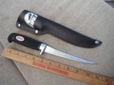 Like new Rapala fishing knife with sheath.  Fishing Fillet Knife Made in Finland.   Stainless Steel
