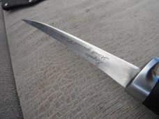 Like new Rapala fishing knife with sheath.  Fishing Fillet Knife Made in Finland.   Stainless Steel