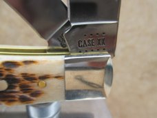Case XX Amber Bone Peach Seed Jigged Trapper  CV Blades   New In Box 