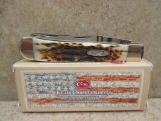 Case XX Amber Bone Peach Seed Jigged Trapper  CV Blades   New In Box 
