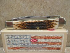 Case XX Amber Bone Peach Seed Jigged Trapper  CV Blades   New In Box 
