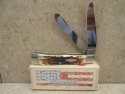 Case XX Amber Bone Peach Seed Jigged Trapper  CV Blades   New In Box 