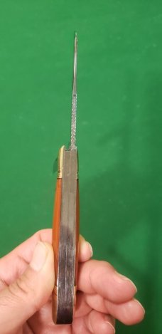 4 1/8" Custom Made Bird's Head Bolster Trapper, Amber Handled with nice file work