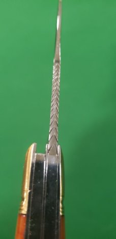 4 1/8" Custom Made Bird's Head Bolster Trapper, Amber Handled with nice file work