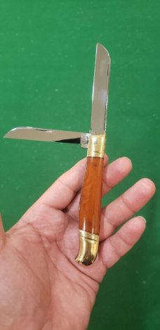 4 1/8" Custom Made Bird's Head Bolster Trapper, Amber Handled with nice file work