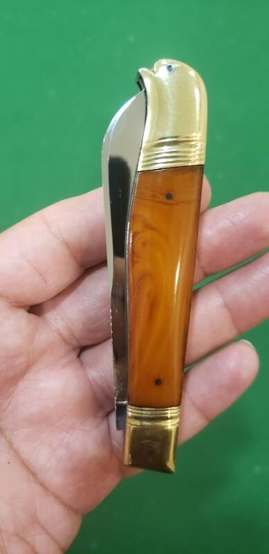 4 1/8" Custom Made Bird's Head Bolster Trapper, Amber Handled with nice file work