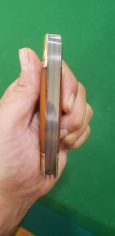 4 1/8" Custom Made Bird's Head Bolster Trapper, Amber Handled with nice file work