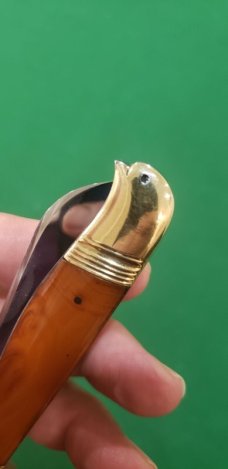 4 1/8" Custom Made Bird's Head Bolster Trapper, Amber Handled with nice file work