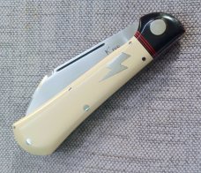 K'roo Raven..3.75".Antique Ivory Paper Micarta..Oryx Horn Bolsters.. rwl34. Filework spacers..liners