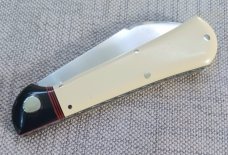 K'roo Raven..3.75".Antique Ivory Paper Micarta..Oryx Horn Bolsters.. rwl34. Filework spacers..liners