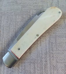 Riaan Ras Bleached Giraffe Bone.Swayback Native N690 polish..Fluted bolsters..4 clsd..long pull..coa