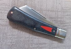 K'roo Jackal..Dogleg Sheepsfoot..Denim Micarta..3.75"..Rwl34..red houndstooth and accents...coa/slip