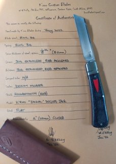 K'roo Jackal..Dogleg Sheepsfoot..Denim Micarta..3.75"..Rwl34..red houndstooth and accents...coa/slip