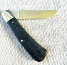 Kabisch Drop Point Trapper. Dark blue Denim Micarta and 01 tool steel...3.75" closed. Stunning piece