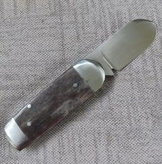 Riaan Ras Natural Giraffe Bone.Elephant Toe. N690 polish.. bolsters & caps.3.25 clsd..long pull..coa