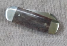 Riaan Ras Natural Giraffe Bone.Elephant Toe. N690 polish.. bolsters & caps.3.25 clsd..long pull..coa
