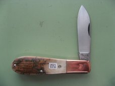 DANIELS FAMILY KNIFE BRANDS-TITUSVILLE CUTLERY MAMMOTH IVORY OLD MAN NORMAN
