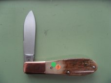 DANIELS FAMILY KNIFE BRANDS-TITUSVILLE CUTLERY MAMMOTH IVORY OLD MAN NORMAN
