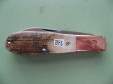 DANIELS FAMILY KNIFE BRANDS-TITUSVILLE CUTLERY MAMMOTH IVORY OLD MAN NORMAN