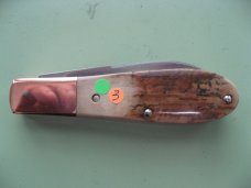 DANIELS FAMILY KNIFE BRANDS-TITUSVILLE CUTLERY MAMMOTH IVORY OLD MAN NORMAN
