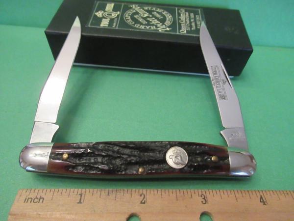 Queen Cutlery Amber Carved Stag Bone Muskrat Model # 66ACSB