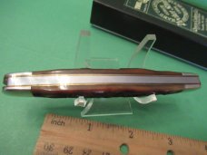 Queen Cutlery Amber Carved Stag Bone Muskrat Model # 66ACSB