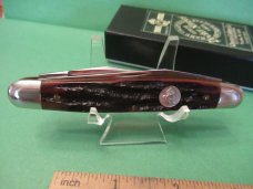 Queen Cutlery Amber Carved Stag Bone Muskrat Model # 66ACSB