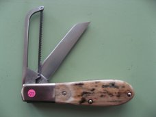 DANIELS FAMILY KNIFE BRANDS-NAPANOCH KNIFE CO.-NORTH AMERICAN GAME WARDEN MAMMOTH IVORY