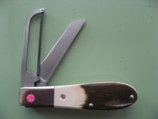 DANIELS FAMILY KNIFE BRANDS-NAPANOCH KNIFE CO.-NORTH AMERICAN GAME WARDEN MAMMOTH IVORY