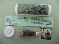 DANIELS FAMILY KNIFE BRANDS-NAPANOCH KNIFE CO- GAME WARDEN MAMMOTH IVORY PROTOTYPE