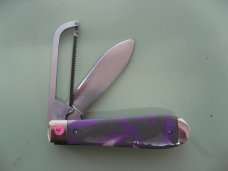 DANIELS FAMILY KNIFE BRANDS-NAPANOCH KNIFE CO.- GAME WARDEN WOMAN WARRIOR ACRYLIC PROTOTYPE