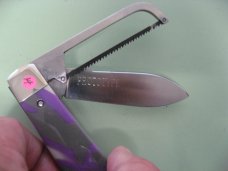 DANIELS FAMILY KNIFE BRANDS-NAPANOCH KNIFE CO.- GAME WARDEN WOMAN WARRIOR ACRYLIC PROTOTYPE