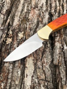 BUCK 113 CUSTOM LEROY REMER ORANGE JIGGED SKNNER